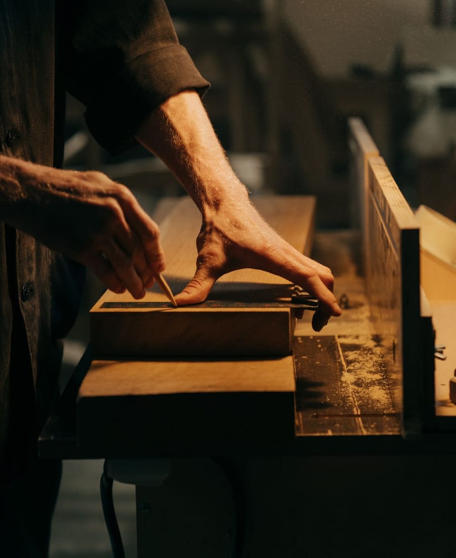 A Marwood craftsman carrying out careful, detailed finishing work