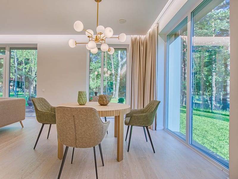 Bright modern open-plan living and dining room freshly painted in Collier Row