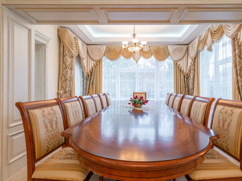 Elegant period dining room with restored ornate cornicing and panelling in Gidea Park