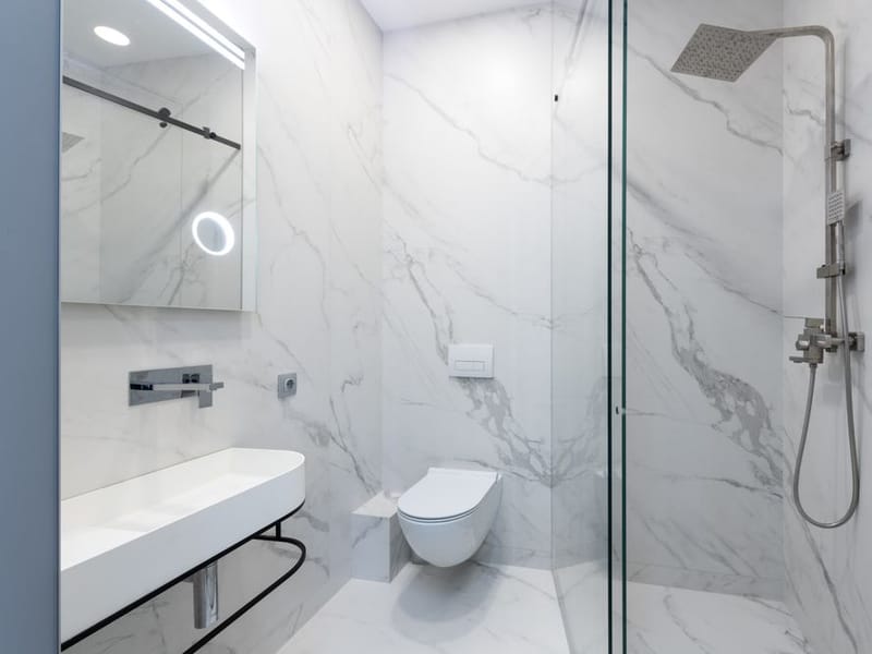 Freshly redecorated modern bathroom with crisp white detailing in Harold Hill