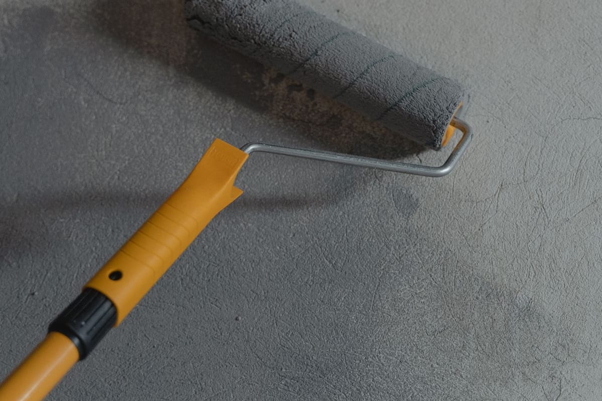 A decorator’s well-kept brushes and tools laid out ready for the job